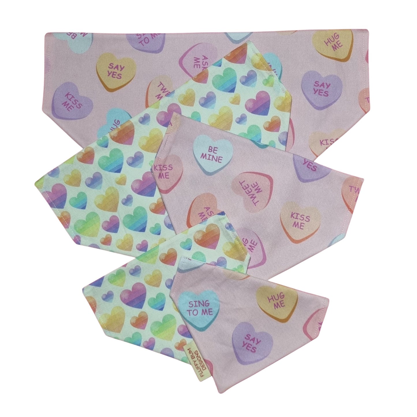 Set of colorful heart-patterned bandanas on a white background