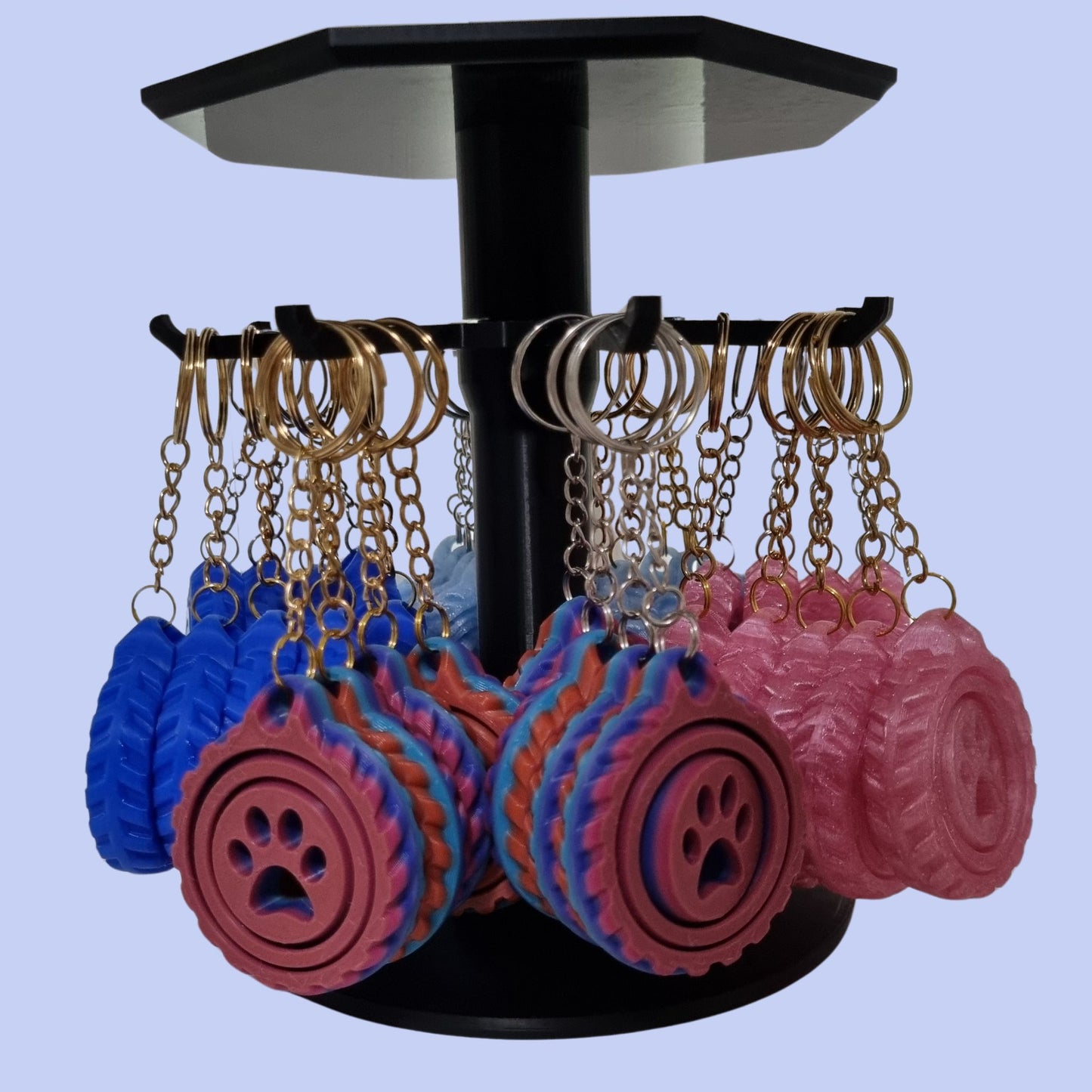 Range of Paw Spinner Keychains on Carousal stand
